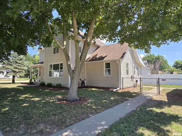 800 13th Ave, Fulton, IL 61252 - view of front of house featuring a gate and roof with shingles