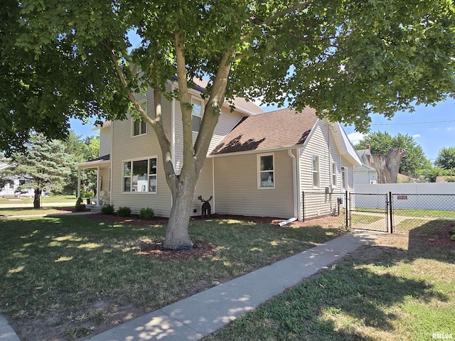800 13th Ave, Fulton, IL 61252 - view of front facade featuring a gate and roof with shingles