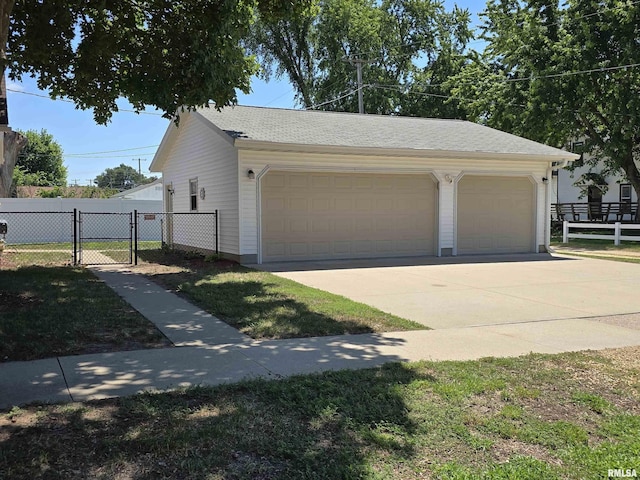 800 13th Ave, Fulton, IL 61252 - detached garage featuring a gate