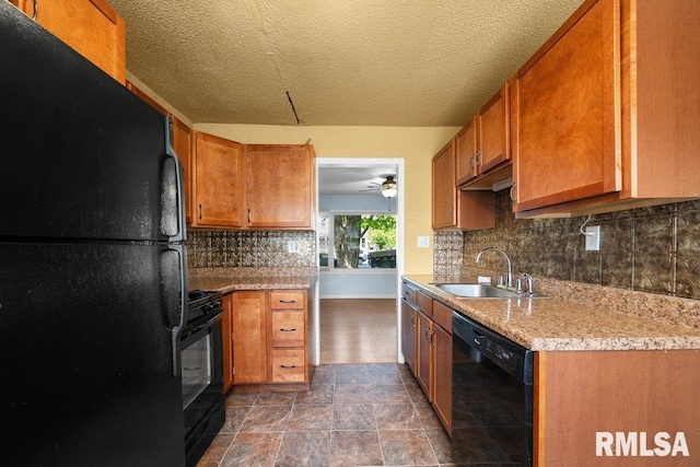 2043 30th St, Rock Island, IL 61201 - kitchen with black appliances, brown cabinets, tasteful backsplash, a ceiling fan, and light countertops