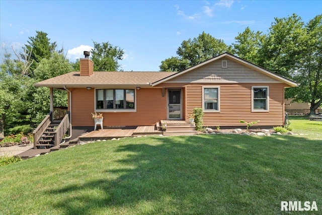 129 Glenview Dr, Sherrard, IL 61281 - view of front of house featuring a chimney, a front yard, a deck, and a shingled roof