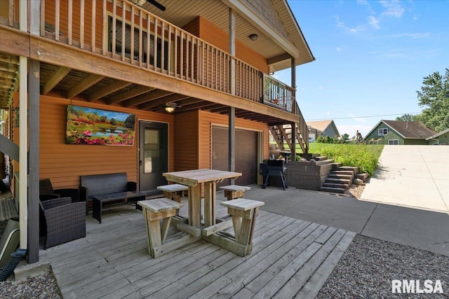 129 Glenview Dr, Sherrard, IL 61281 - wooden terrace with stairway, a garage, outdoor lounge area, and a patio