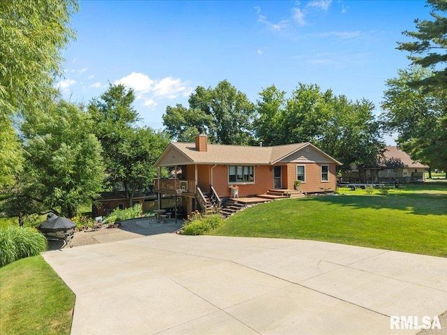 129 Glenview Dr, Sherrard, IL 61281 - view of front of house featuring a chimney and a front yard