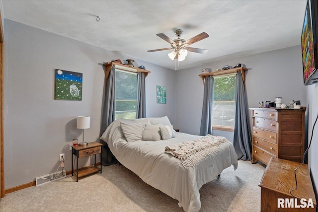 129 Glenview Dr, Sherrard, IL 61281 - bedroom featuring light carpet and ceiling fan