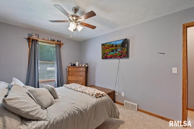 129 Glenview Dr, Sherrard, IL 61281 - bedroom with light carpet and a ceiling fan