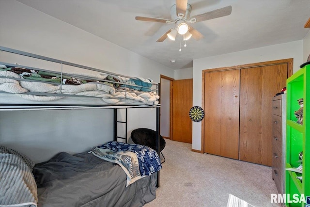 129 Glenview Dr, Sherrard, IL 61281 - bedroom featuring light colored carpet, a closet, and ceiling fan