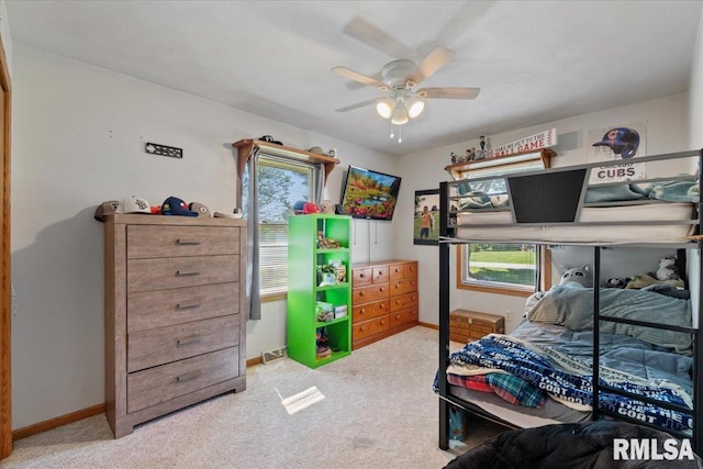 129 Glenview Dr, Sherrard, IL 61281 - bedroom with carpet flooring, multiple windows, and ceiling fan