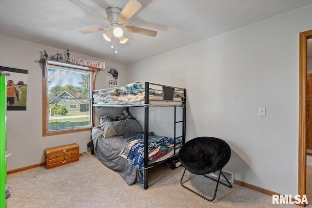 129 Glenview Dr, Sherrard, IL 61281 - carpeted bedroom featuring ceiling fan and baseboards