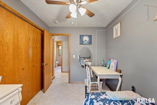 129 Glenview Dr, Sherrard, IL 61281 - bedroom with light carpet, a closet, and a ceiling fan