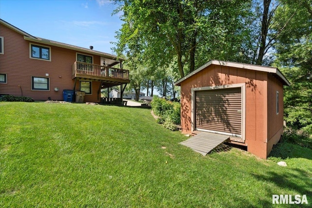 129 Glenview Dr, Sherrard, IL 61281 - view of grassy yard featuring a storage shed and a deck