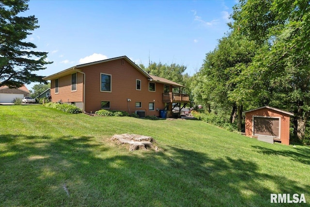 129 Glenview Dr, Sherrard, IL 61281 - rear view of house with a storage shed, a yard, and a wooden deck