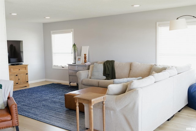 300 S 1st St, Camp Point, IL 62320 - living area with light wood-style flooring and recessed lighting