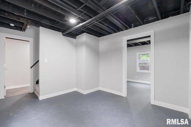 619 51st St, Moline, IL 61265 - basement with baseboards and stairs