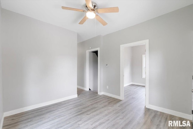 619 51st St, Moline, IL 61265 - spare room featuring ceiling fan and wood finished floors