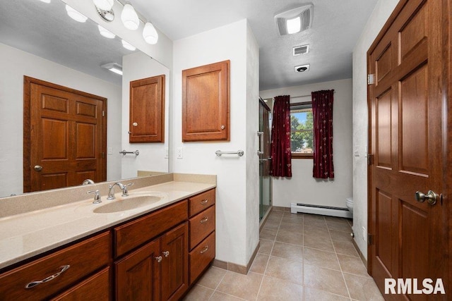 22 Pleasant View Dr, Annawan, IL 61234 - bathroom with a baseboard heating unit, vanity, a shower stall, and tile patterned flooring