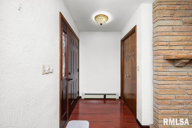 22 Pleasant View Dr, Annawan, IL 61234 - corridor featuring a baseboard radiator and dark wood finished floors