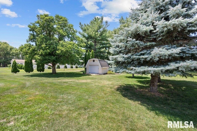 22 Pleasant View Dr, Annawan, IL 61234 - view of green lawn featuring an outdoor structure and a garage