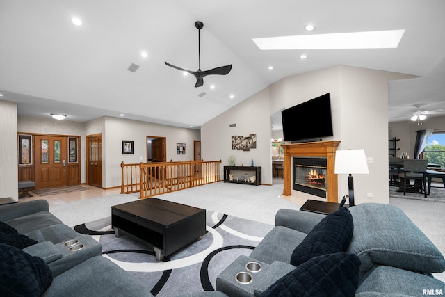 12828 25th Street Ct, Milan, IL 61264 - living area with ceiling fan, a skylight, light colored carpet, recessed lighting, and a fireplace with flush hearth