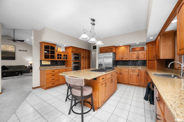 12828 25th Street Ct, Milan, IL 61264 - kitchen with stainless steel appliances, a kitchen island, backsplash, light tile patterned floors, and vaulted ceiling