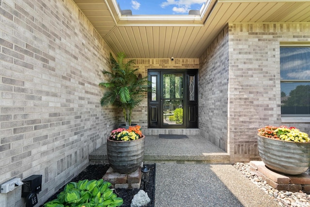12828 25th Street Ct, Milan, IL 61264 - doorway to property featuring brick siding