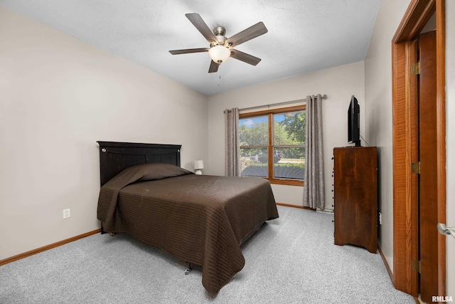 12828 25th Street Ct, Milan, IL 61264 - bedroom featuring light carpet and ceiling fan