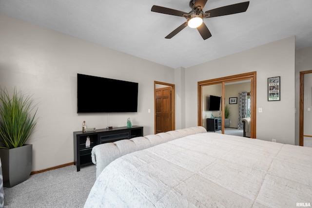 12828 25th Street Ct, Milan, IL 61264 - bedroom with carpet, a closet, and a ceiling fan