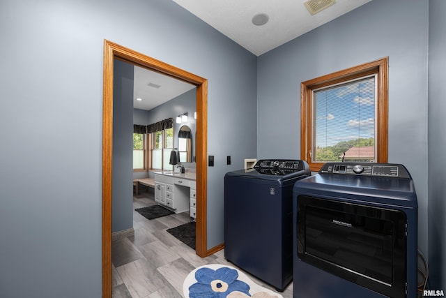 12828 25th Street Ct, Milan, IL 61264 - washroom with washer and dryer and an office area
