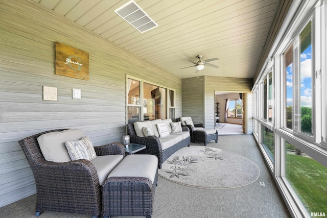12828 25th Street Ct, Milan, IL 61264 - sunroom with a ceiling fan and an outdoor hangout area