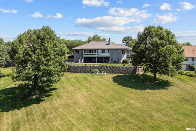 12828 25th Street Ct, Milan, IL 61264 - rear view of property with a lawn