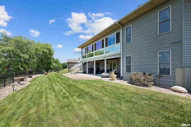 12828 25th Street Ct, Milan, IL 61264 - rear view of house featuring a patio area and stairs