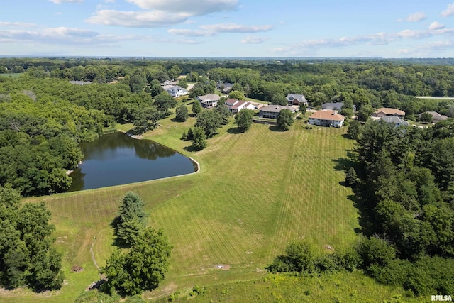 12828 25th Street Ct, Milan, IL 61264 - drone / aerial view of a nearby body of water and a heavily wooded area