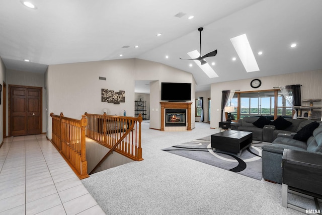 12828 25th Street Ct, Milan, IL 61264 - living room featuring a skylight, high vaulted ceiling, recessed lighting, ceiling fan, and a glass covered fireplace