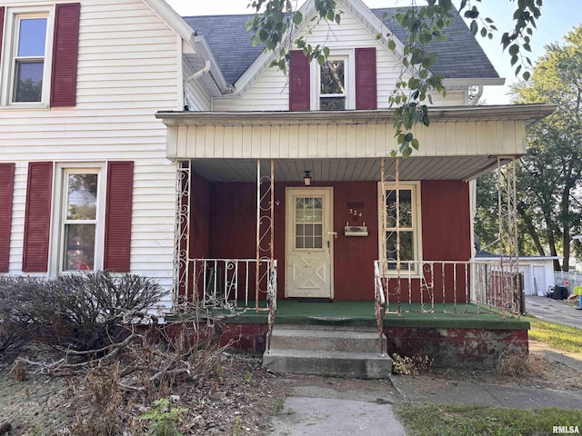 324 S Cottage St, Kewanee, IL 61443 - view of front of home featuring a porch and roof with shingles