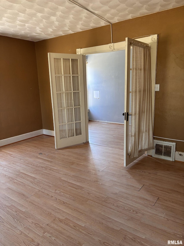324 S Cottage St, Kewanee, IL 61443 - spare room with wood finished floors and baseboards