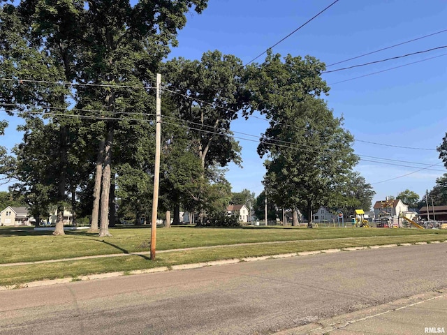 324 S Cottage St, Kewanee, IL 61443 - view of asphalt road with sidewalks and curbs