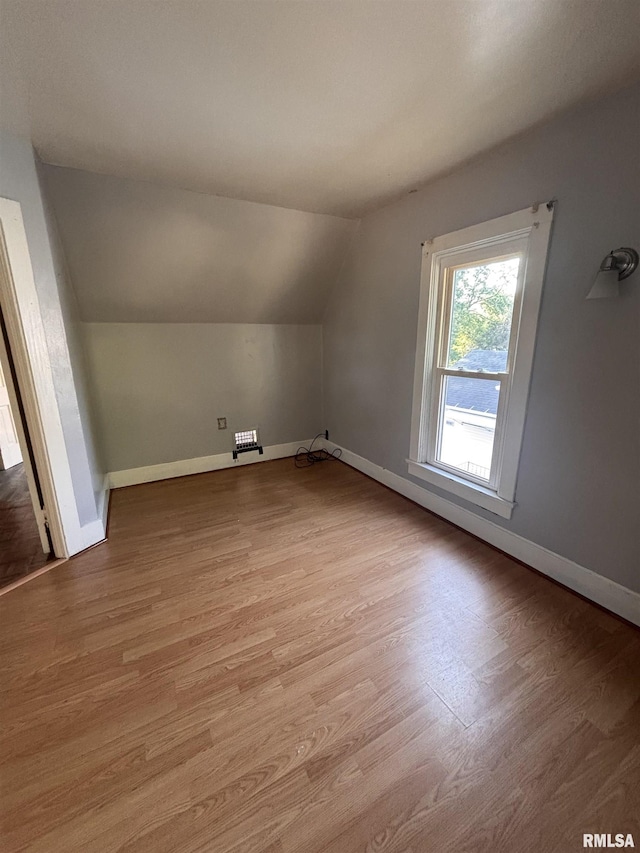 324 S Cottage St, Kewanee, IL 61443 - bonus room featuring light wood-style flooring and lofted ceiling