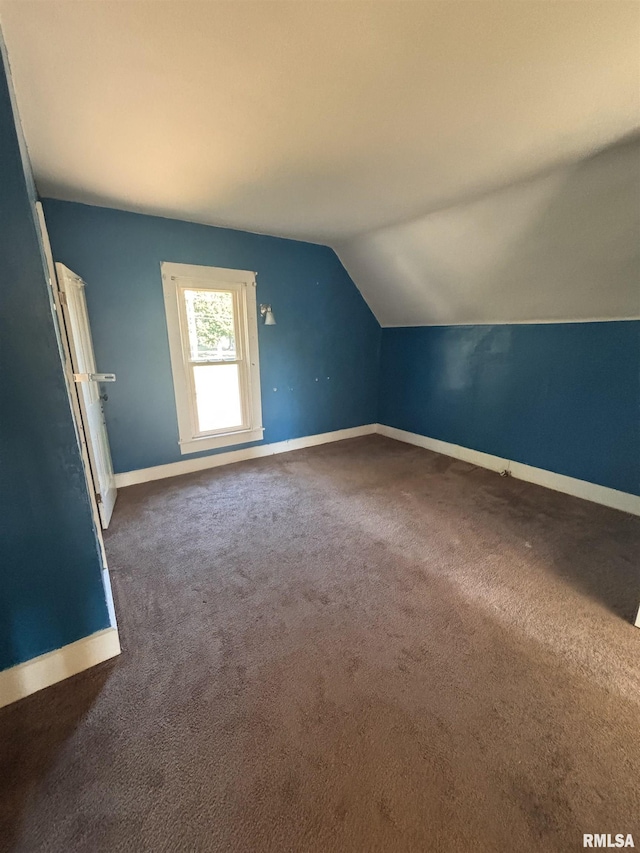 324 S Cottage St, Kewanee, IL 61443 - additional living space with lofted ceiling and carpet