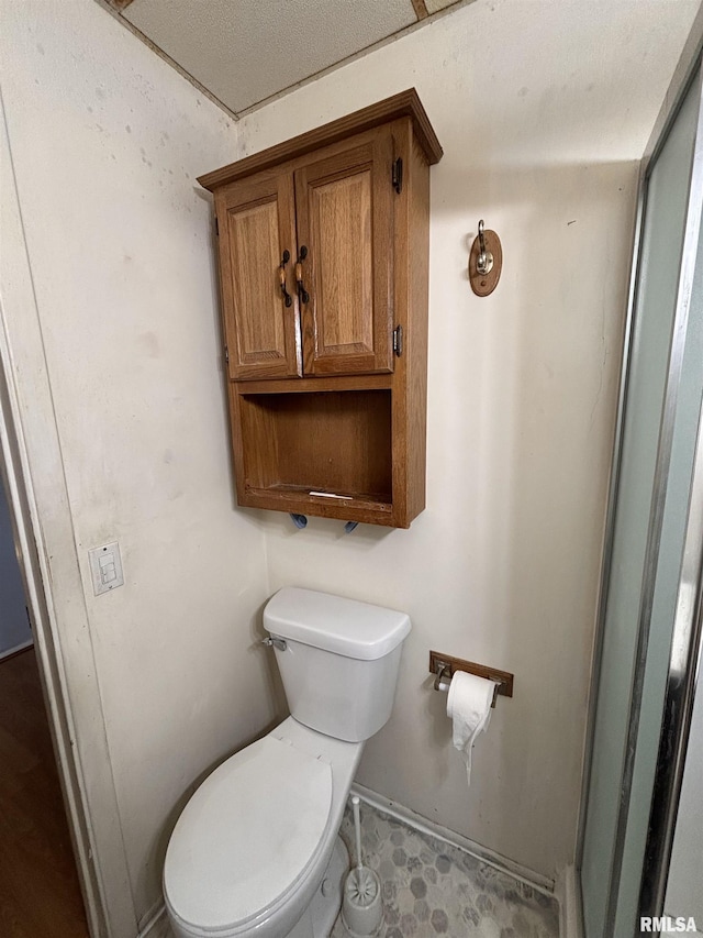 324 S Cottage St, Kewanee, IL 61443 - bathroom with toilet and baseboards