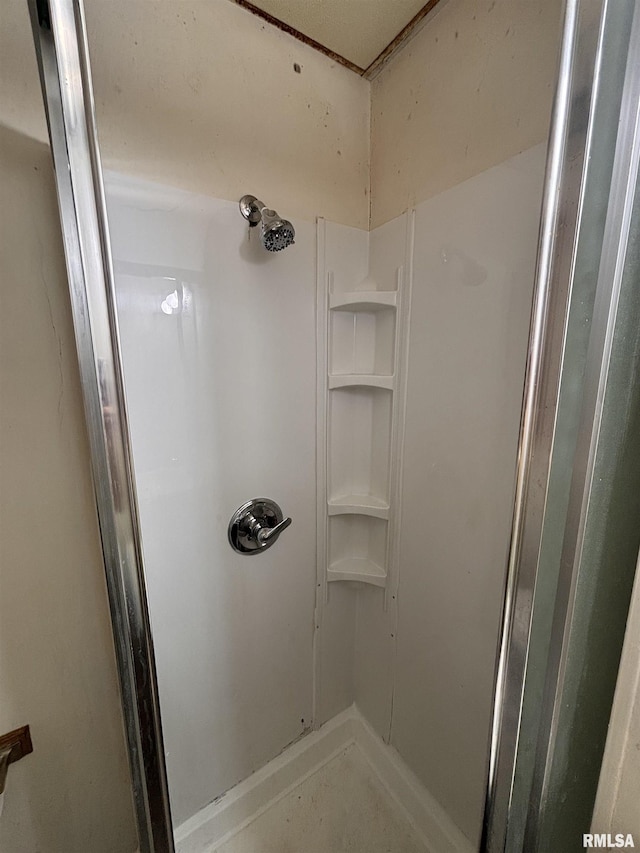 324 S Cottage St, Kewanee, IL 61443 - bathroom featuring a stall shower and built in features