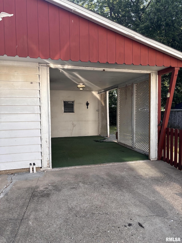 324 S Cottage St, Kewanee, IL 61443 - garage with an attached carport and asphalt driveway