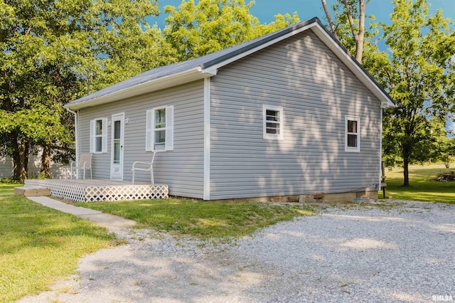504 E Vermont St, Carterville, IL 62918 - view of property exterior with a lawn