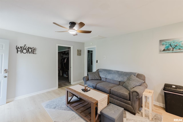 504 E Vermont St, Carterville, IL 62918 - living room featuring light wood-type flooring and ceiling fan
