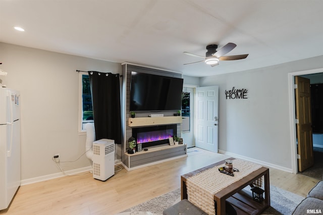 504 E Vermont St, Carterville, IL 62918 - living room with wood finished floors, ceiling fan, and recessed lighting