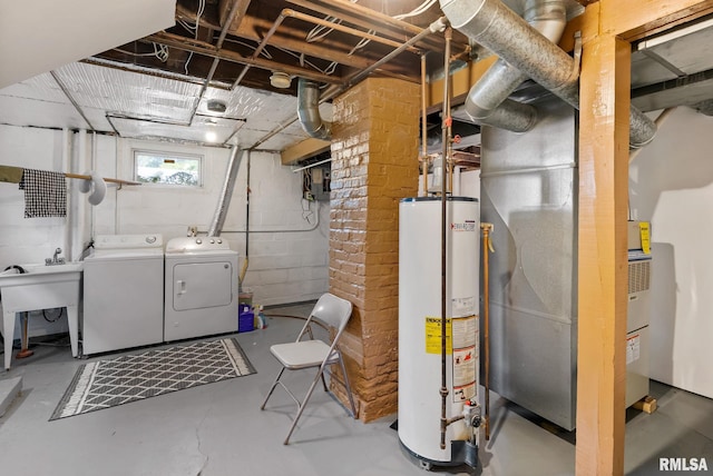 2016 12th St, Rock Island, IL 61201 - below grade area featuring gas water heater and washing machine and dryer