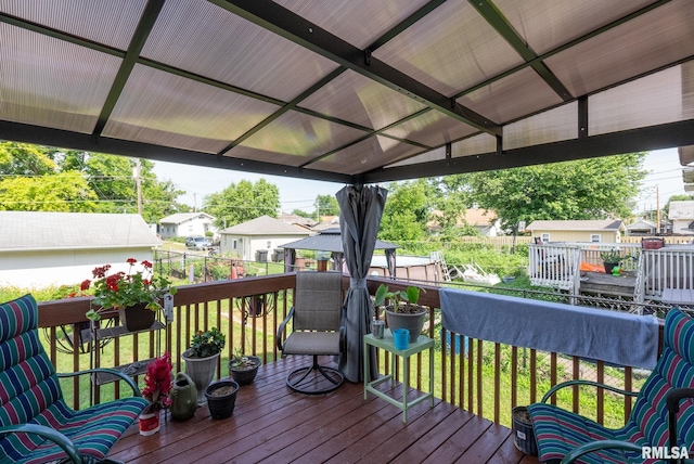 2016 12th St, Rock Island, IL 61201 - wooden deck with a fenced backyard, a gazebo, and a residential view