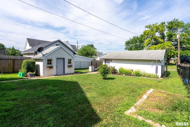 2016 12th St, Rock Island, IL 61201 - fenced backyard featuring an outdoor structure