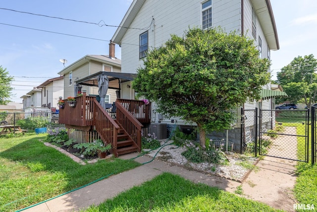 2016 12th St, Rock Island, IL 61201 - back of property with a gate, a deck, and a gazebo