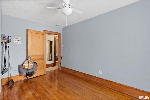 2016 12th St, Rock Island, IL 61201 - spare room with wood finished floors and a ceiling fan