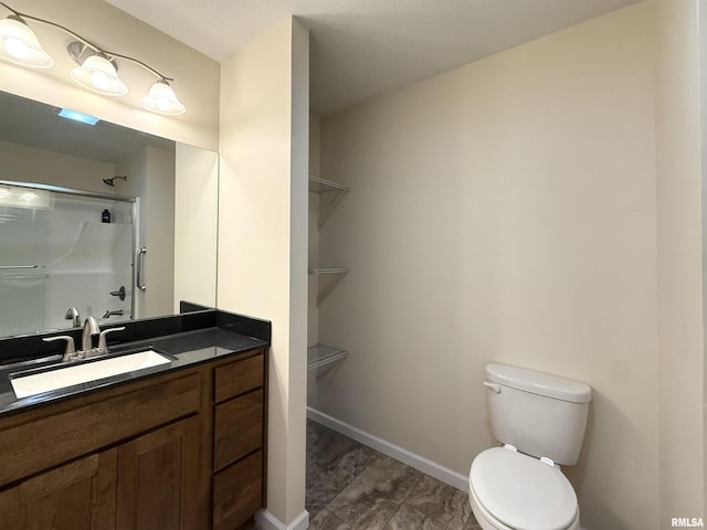312 Mcvicker Dr, Energy, IL 62933 - bathroom with a shower, vanity, and a walk in closet