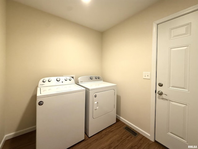 312 Mcvicker Dr, Energy, IL 62933 - laundry room featuring independent washer and dryer and dark wood-style floors